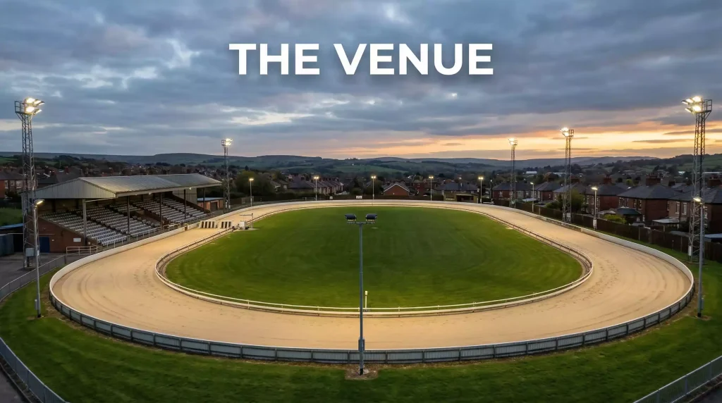 Owlerton greyhound stadium in Sheffield with the track visible under evening floodlights